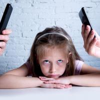 Distracted parents neglecting child