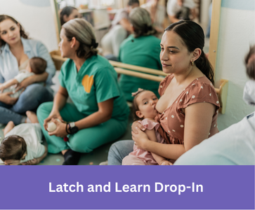 a group of women feeding their babies