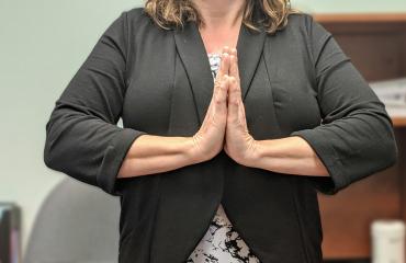 Woman doing Namaste sign