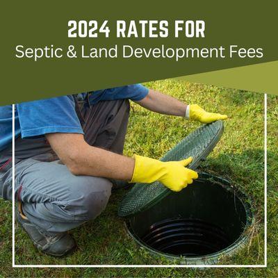 man lifting top of septic tank