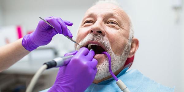 Senior receiving dental care