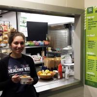 Person eating from the healthy choices menu